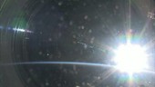 Earth view with sunburst from the ISS