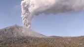 Volcano erupting with ash in sky, Sakurajima