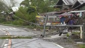 Broken power line blocking road, Philippines