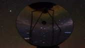 Night sky reflected in telescope dish