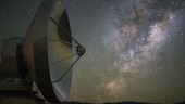 Night sky reflected in telescope dish