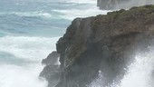 Typhoon waves hitting cliffs