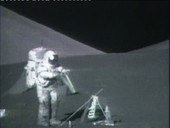Apollo 17 astronaut throwing an object on the Moon