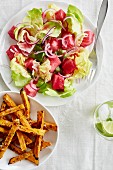 Salmon ceviche with beetroot and sweet potato fries