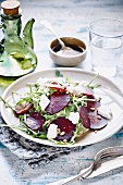 Roasted beet salad with arugula, pine nuts and goat cheese