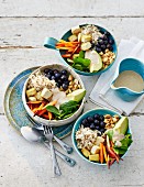 Buddha bowls with tofu, rice and vegetables