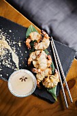 Asian dish - grilled prawns in hairy dough