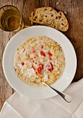 Alaskan King crab and corn chowder with bread and wine