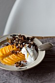 White tea granola with homemade coconut yoghurt and kaki