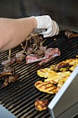 Lamb chops and vegetables on a grill