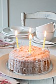 Lemon cake with birthday candles
