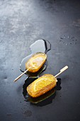 Homemade orange ice lolly on a stick
