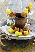 Fried turkey kebabs with curry and pineapple