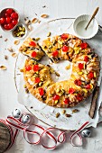 Couronne (Three Kings cake from France) with candied cherries and pistachios