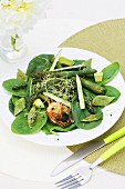 Asparagus and spinach salad with sprouts and fried artichokes
