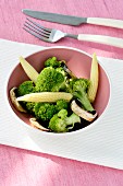 Broccoli salad with baby corn and mushrooms