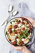 Spaghetti Caprese with roasted tomatoes, basil and mozzarella