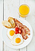 Traditional breakfast eggs with bacon