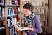 Young woman using a netbook