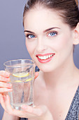 Woman drinking mineral water
