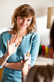 Teenage girl refusing a cigarette