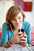 Teenage girl listening to music