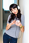 Young woman listening music