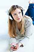 Young woman listening to music