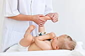 Baby receiving massage