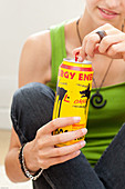 Teenage girl and energy drink