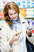 Woman buying medications