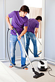 Man vacuuming