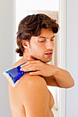 Man using a gel pack