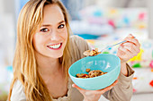 Woman eating cereals