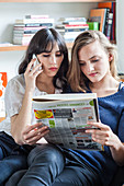 Women reading ads