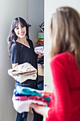 Women organizing clothes