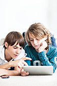 Teenagers using iPad