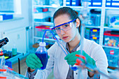 Woman working in chemical laboratory