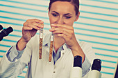 Woman testing food samples