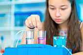 Girl experimenting with fuel cell