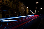 Main road and car tail lights at night