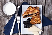 French Toast with blackberries, cheese and milk