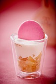 Yogurt with pears and a pink biscuit