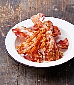 Crispy fried bacon on plate