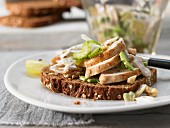 Chicken salad with grapes and nuts on toasted bread