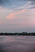 View of the Outer Alster with sailing boats in Hamburg, Germany
