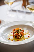 Vegetable tartare with tomatoes, courgettes, carrots, potatoes and asparagus