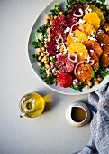 Chickpea and rocket salad with three types of orange slices
