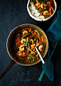 Red Thai curry with prawns, vegetables and rice