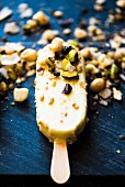 A chocolate ice lolly with dukkah (a blend of nuts and spices)